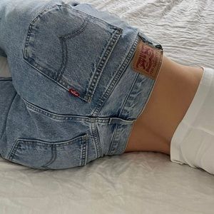 vintage levi’s button fly 501 light wash straight leg relaxed fit jeans